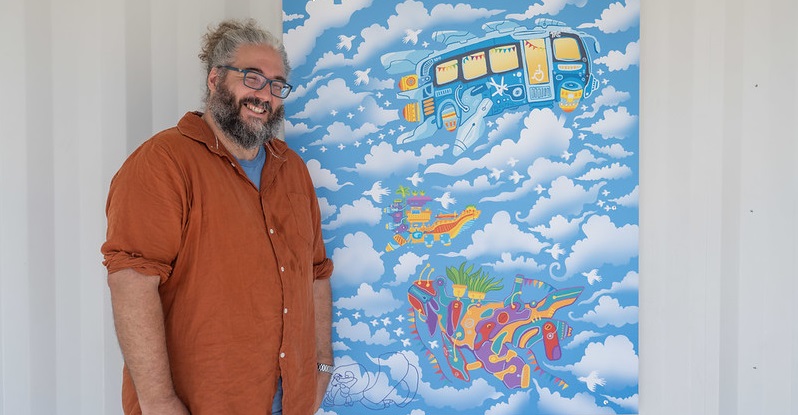 Paul Summerfield in front of his work ACT Transport Present to Future Visions