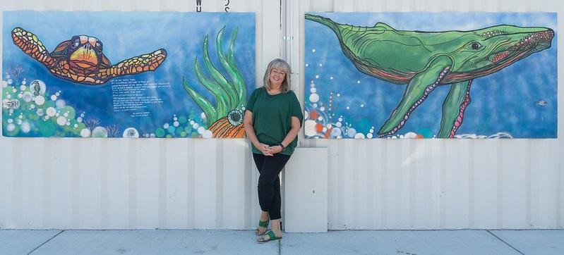 Tracy in front of her work -  Ode To Our Oceans