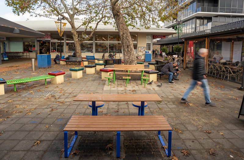A courtyard with tables and seating.